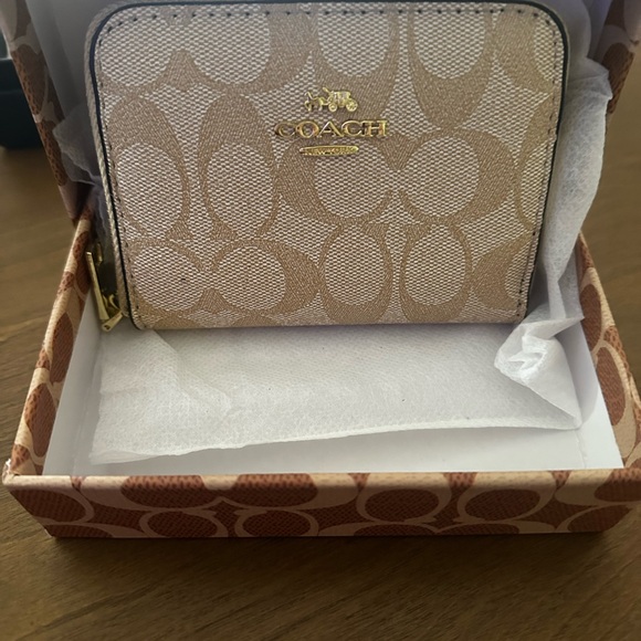 Coach Handbags - Coach Pink and Tan Signature Zip Card Case with Gold Hardware